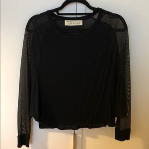 Black top with sheet sleeves
